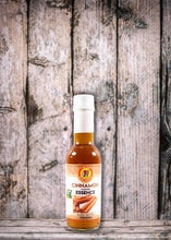 Load image into Gallery viewer, Cinnamon, Chief Orange Essence, Chief Essence, Orange Essence, Baking Essence, Cooking Essence, Trinidad Baking, Trinidad Cooking, Trinidad Cusine, Chief products, Chief Trinidad, Trinidad foods London, Trinidad products UK,  Trinidad and Tobago, Trinidad, My Trini Shop, Trinidad Shop, Trini Shop, Trini food London, Trinidad Curry, Caribbean foods, Caribbean Shop London, Caribbean, Trinidad Grocery, Trinidad food, Trinidad seasoning, Trinidad All Purpose Seasoning, Herbs and Spices, Essence, Cardamon Essenc
